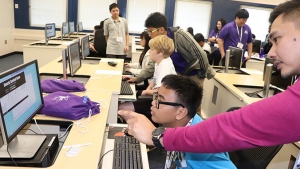 Students working at laptops