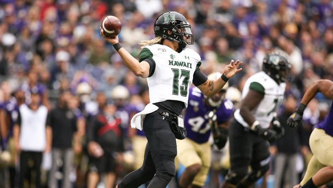 quarterback throwing football