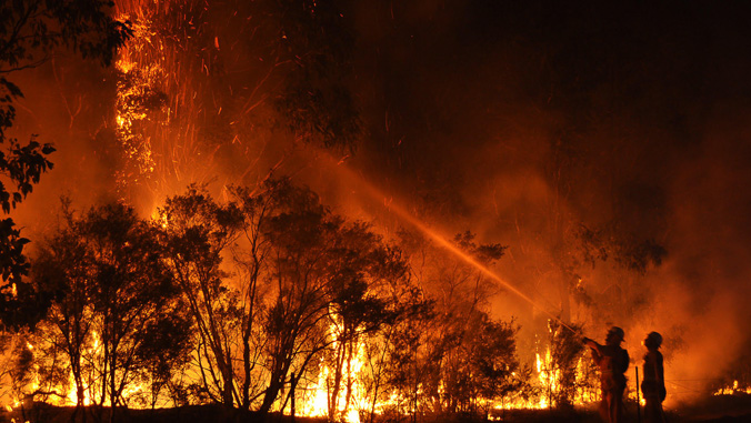 firefighters putting out fire