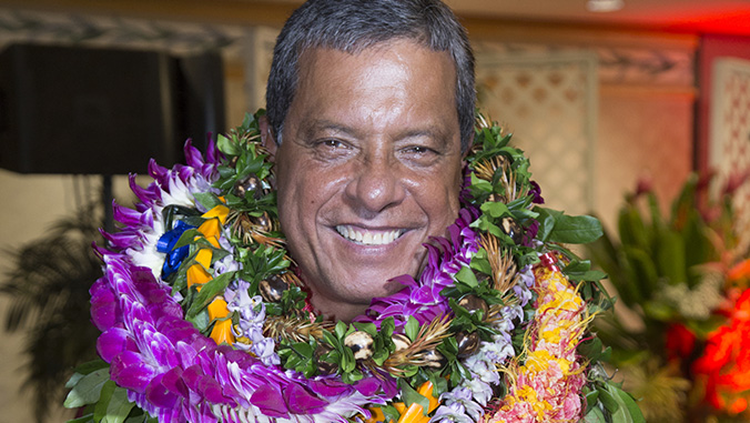Osorio with many lei