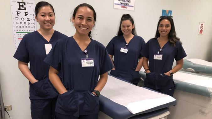 four medical assisting students