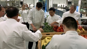 chefs looking at produce