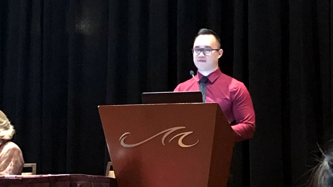 Michael Wong at lecture podium
