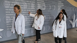 Students walking through a hallway