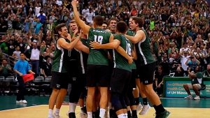 Men's volleyball team celebrating