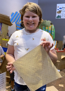 girl holding beeswax paper