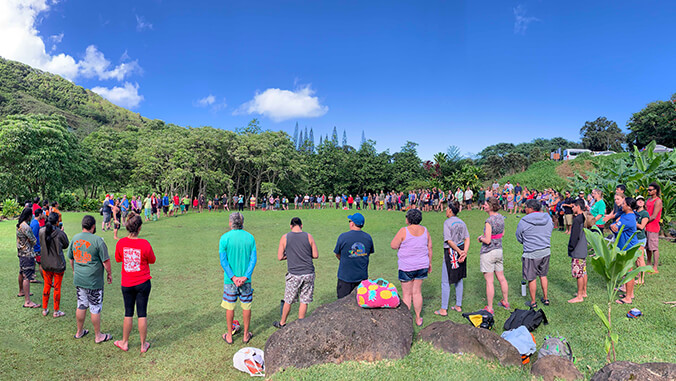 people standing in a circle outside