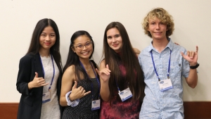 Four students smiling