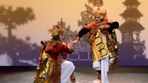 people dancing in balinese clothing