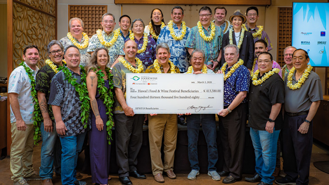 group photo with big check
