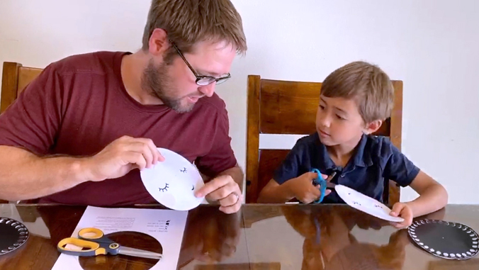 father and son working on a science project