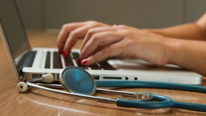 laptop with stethoscope