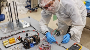 researcher testing electrical cable