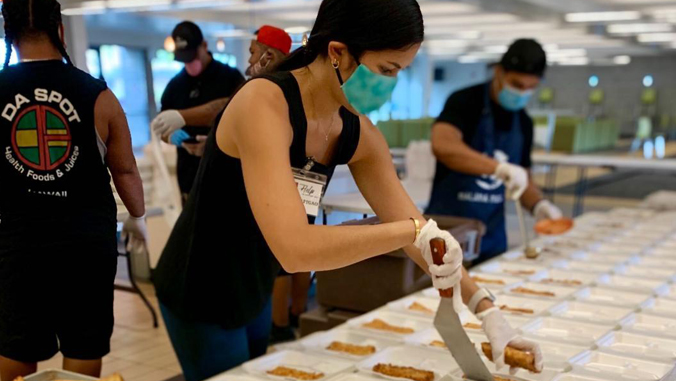 woman plating meals