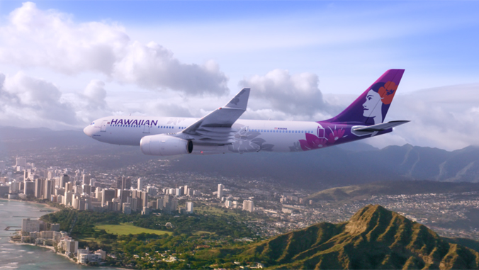 Hawaiian Airlines plane over Diamond Head