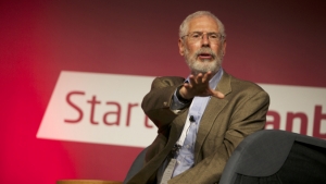 Steve Blank gesturing to crowd