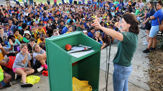 person speaking to students