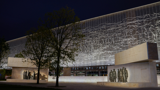 lit up building of the Eisenhower Memorial