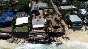 houses on the beach with erosion