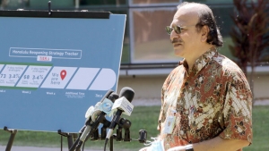Vivek Nerurkar speaking at the podium