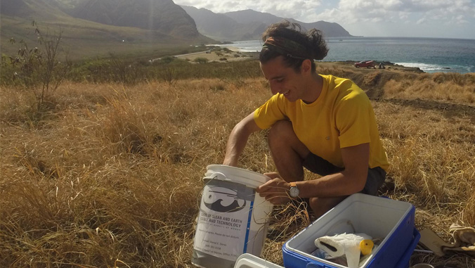 student preparing rainfall collection