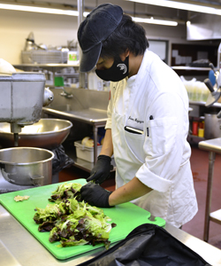 culinary student prepping meal