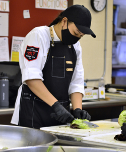 culinary student prepping meal