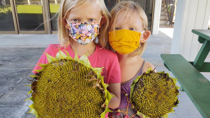 girls with sunflowers