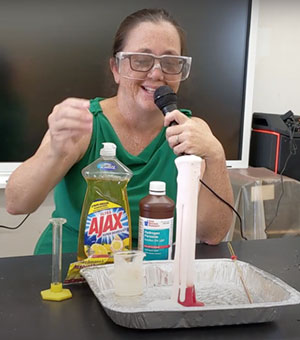 woman with ingredients in a lab