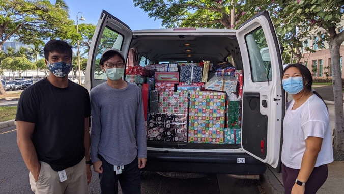 medical students and van with presents