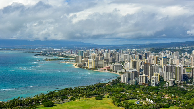 image of buildings and ocean near Honolulu