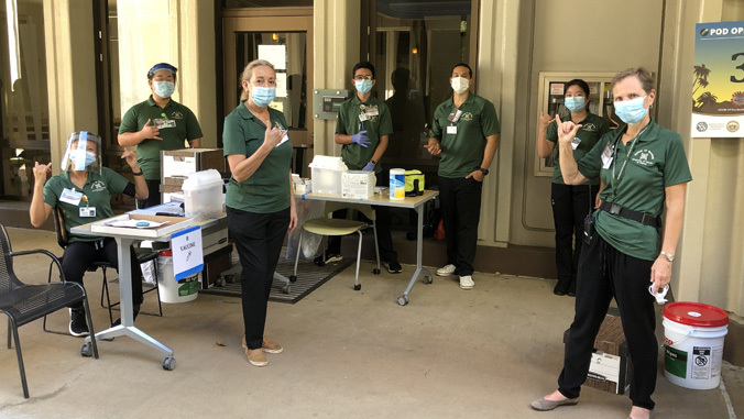 nursing faculty at vaccination site