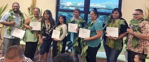 People holding certificates