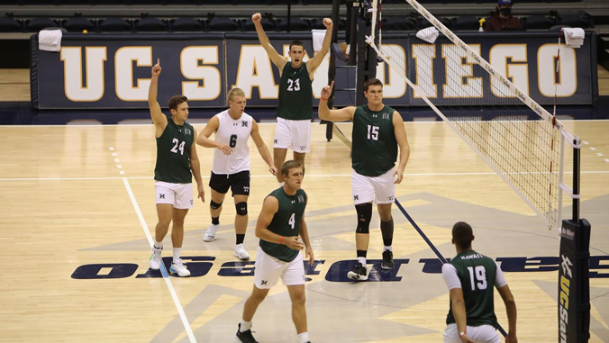 U H men's volleyball players