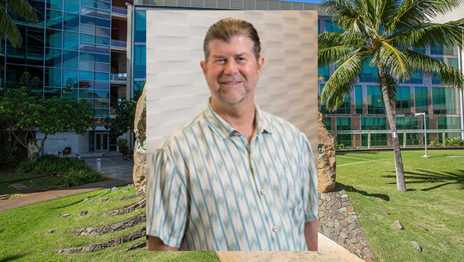 john shepherd headshot with backdrop