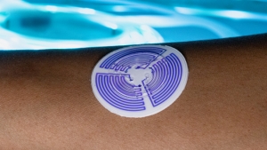 sticker on person's arm