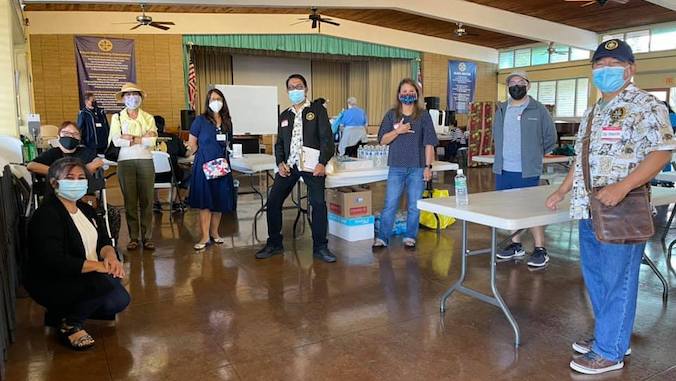 group of people with masks on