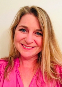 headshot of woman looking at camera