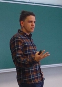 person standing in front of chalkboard
