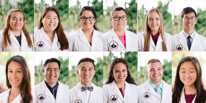 pharmacy students wearing white coats