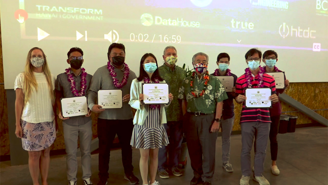 people standing with face masks looking at the camera