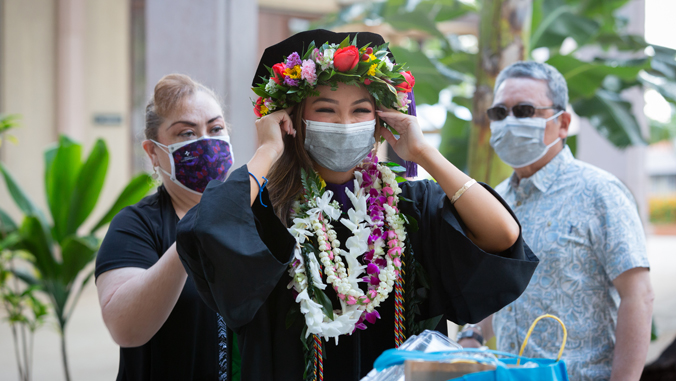 law school graduate getting ready for commencement