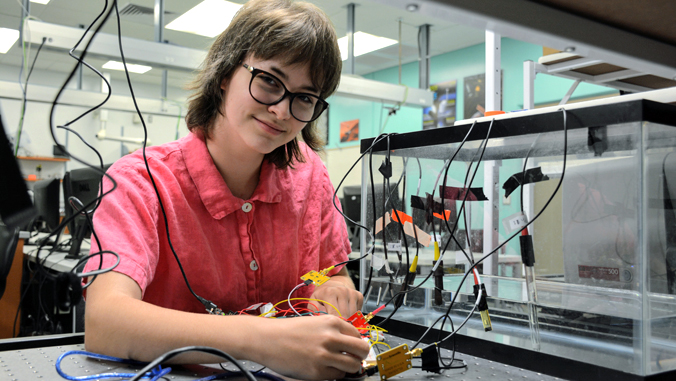 student in electronics lab