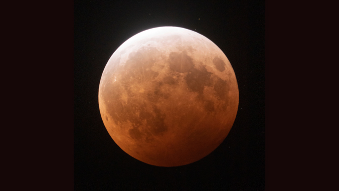 Rust colored moon
