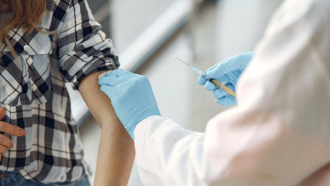 person getting a vaccine