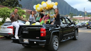 graduate in a truck