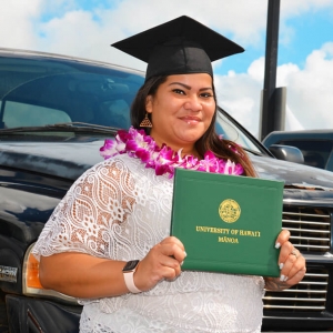 woman holding diploma