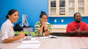 3 people sitting at a table
