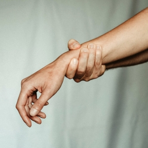 person holding up a hand