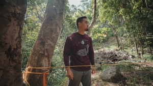 Student near a tree